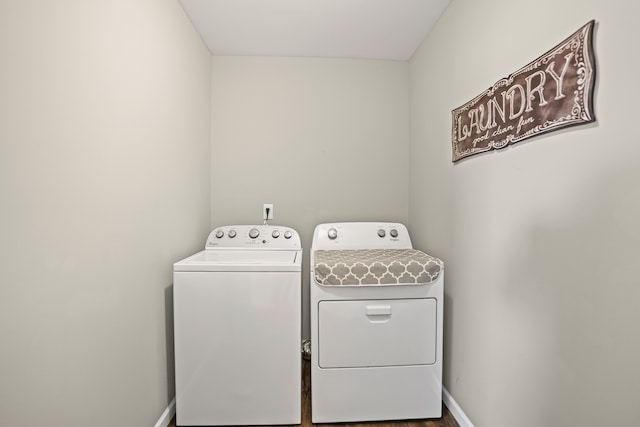 7051 Wildflower, Grand Blanc, MI 48439 - laundry area featuring independent washer and dryer