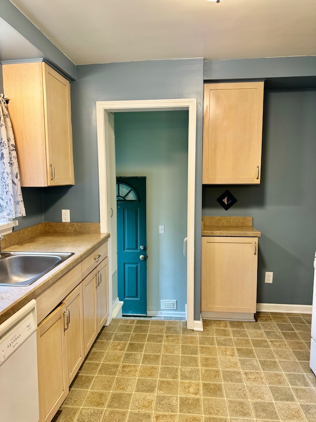 11427 Mercedes, Redford, MI 48239 - kitchen featuring light brown cabinetry, white dishwasher, a sink, and baseboards