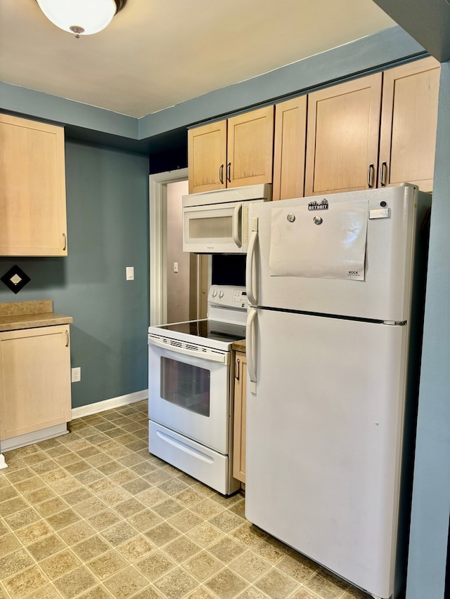 11427 Mercedes, Redford, MI 48239 - kitchen with white appliances, light brown cabinetry, and baseboards