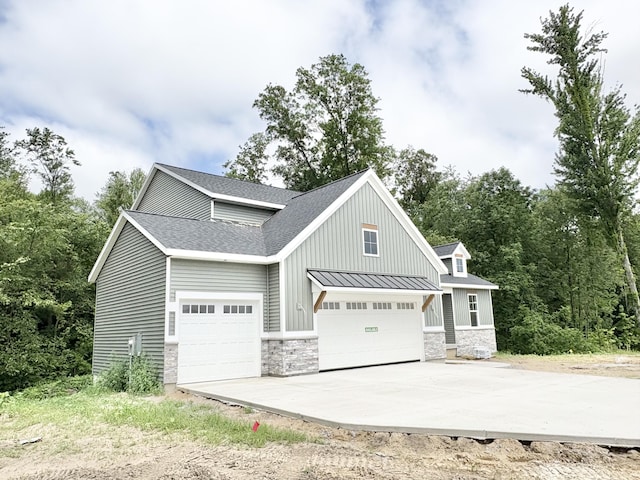 1969 Northfield Ct SW, Byron Center, MI 49315 - garage with concrete driveway