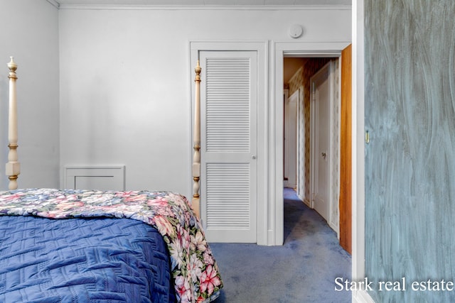 carpeted bedroom featuring ornamental molding