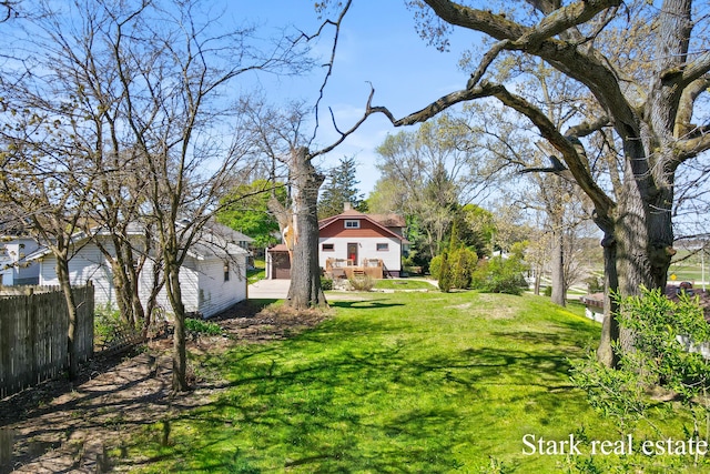 view of yard featuring a wooden deck