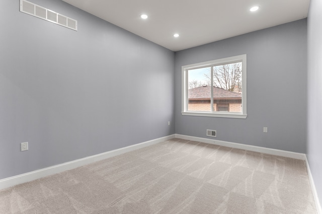 31460 James St, Garden City, MI 48135 - unfurnished room with light carpet, recessed lighting, and baseboards