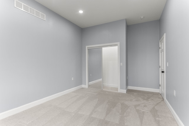 31460 James St, Garden City, MI 48135 - unfurnished bedroom with carpet, baseboards, a closet, and recessed lighting
