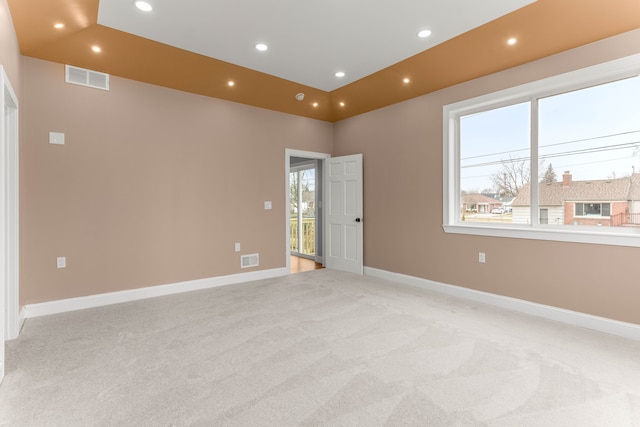 31460 James St, Garden City, MI 48135 - spare room featuring light colored carpet, recessed lighting, and baseboards