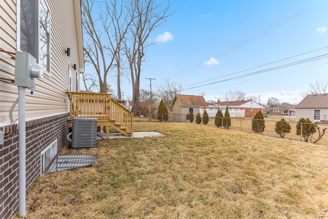 31460 James St, Garden City, MI 48135 - view of yard with central air condition unit, stairs, and a deck