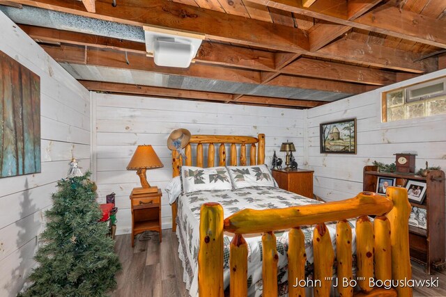 1017 Pearl St, Belding, MI 48809 - bedroom with wooden walls and wood finished floors