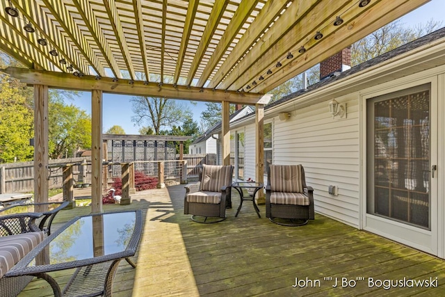 1017 Pearl St, Belding, MI 48809 - wooden deck with fence and a pergola