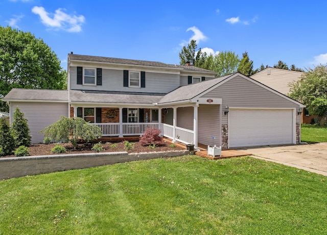 1699 Brentwood Dr, Wixom, MI 48393 - view of front of property featuring a garage, covered porch, a front lawn, and concrete driveway