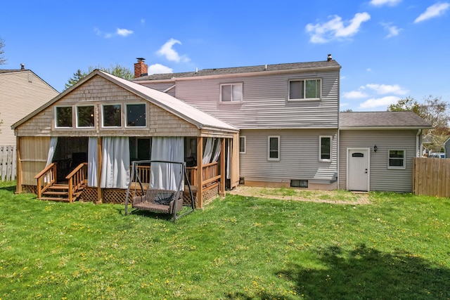 1699 Brentwood Dr, Wixom, MI 48393 - rear view of house featuring a chimney