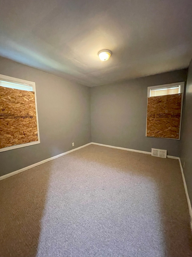 16450 Pembroke Ave, Detroit, MI 48235 - unfurnished room with baseboards and carpet floors