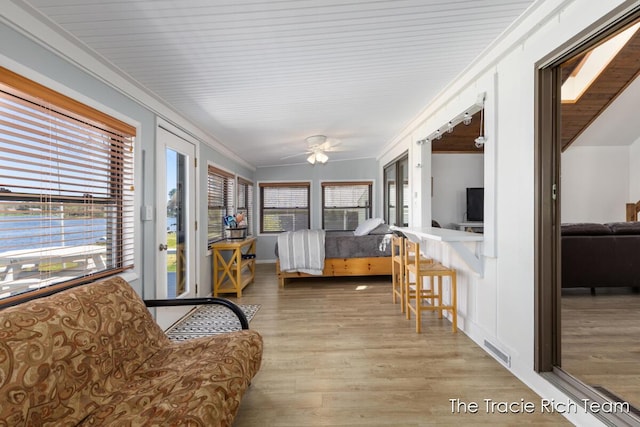 7964 W Royal Rd, Stanwood, MI 49346 - sunroom featuring french doors, ornamental molding, and wood finished floors