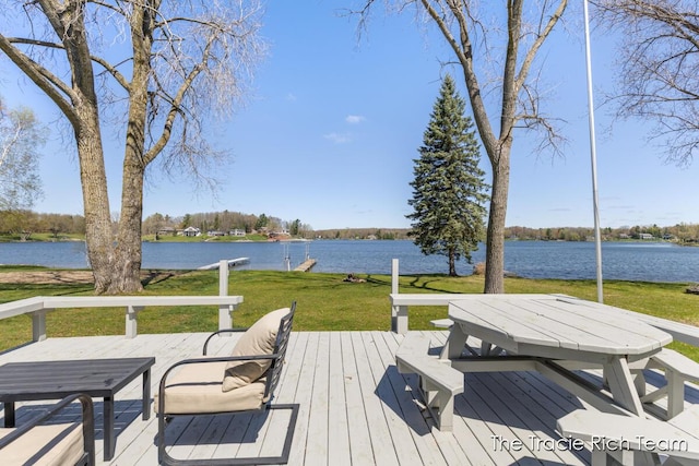7964 W Royal Rd, Stanwood, MI 49346 - deck with a water view and a lawn