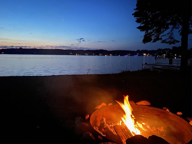 7964 W Royal Rd, Stanwood, MI 49346 - water view with an outdoor fire pit