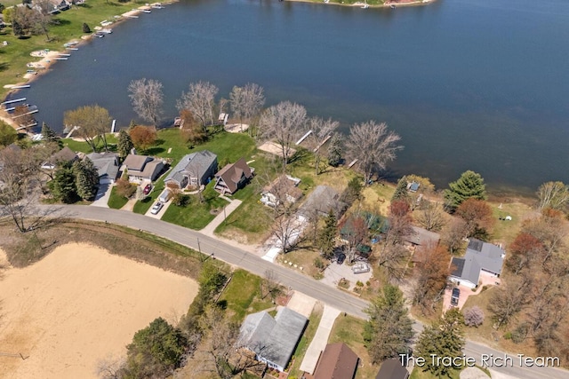 7964 W Royal Rd, Stanwood, MI 49346 - aerial overview of property's location with a large body of water and nearby suburban area