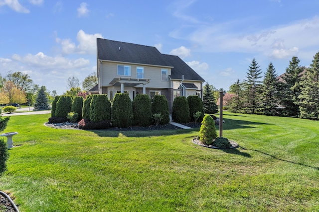 back of property with a pergola and a lawn