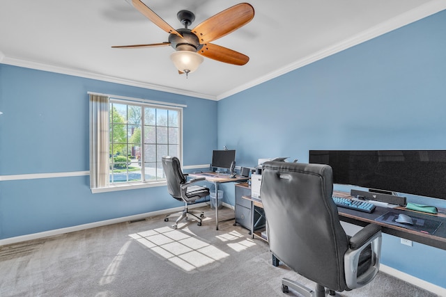 carpeted office featuring ceiling fan, crown molding, and baseboards