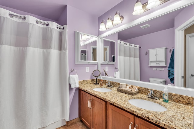 full bathroom with double vanity