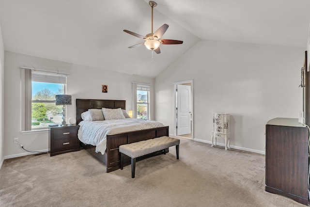 bedroom featuring light colored carpet, high vaulted ceiling, baseboards, and a ceiling fan