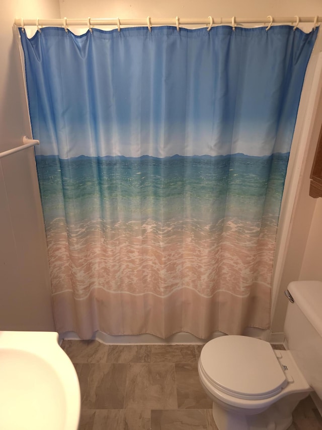 120 S Mackinaw St, Waldron, MI 49288 - full bathroom featuring toilet, a shower with shower curtain, and a sink