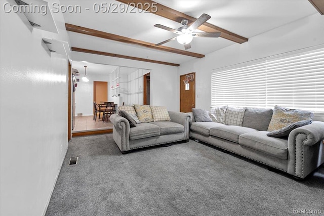 11233 Capri Dr, Warren, MI 48093 - living area with beam ceiling, carpet flooring, and a ceiling fan
