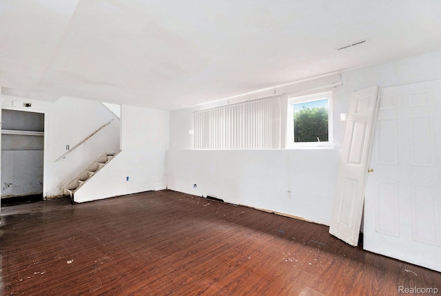 4149 Harriet St, Inkster, MI 48141 - unfurnished living room with wood finished floors and stairs