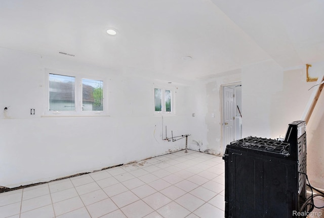 4149 Harriet St, Inkster, MI 48141 - kitchen featuring light tile patterned floors and black gas range oven