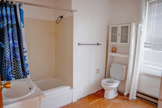 full bathroom with a baseboard radiator, a sink, toilet, bathing tub / shower combination, and baseboards