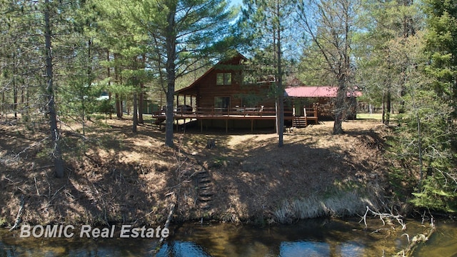 940 Wood River Rd, Grayling, MI 49738 - back of house with a wooden deck