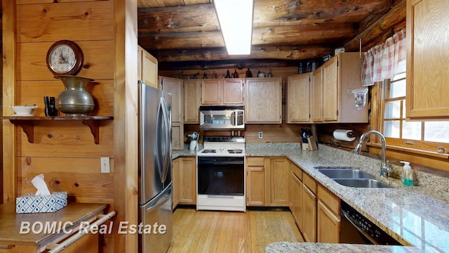 940 Wood River Rd, Grayling, MI 49738 - kitchen with stainless steel appliances, a sink, light wood-type flooring, light stone counters, and wood ceiling