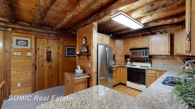 940 Wood River Rd, Grayling, MI 49738 - kitchen featuring stainless steel appliances, a sink, beamed ceiling, light stone countertops, and wood ceiling