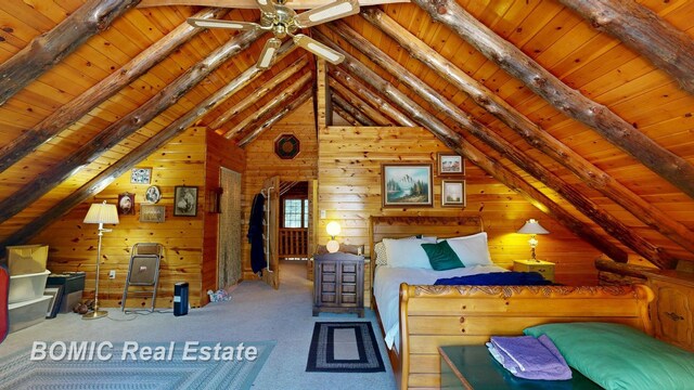 940 Wood River Rd, Grayling, MI 49738 - carpeted bedroom with wood ceiling and wooden walls