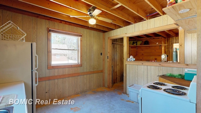 940 Wood River Rd, Grayling, MI 49738 - kitchen with white range with electric stovetop, freestanding refrigerator, a ceiling fan, and unfinished concrete floors