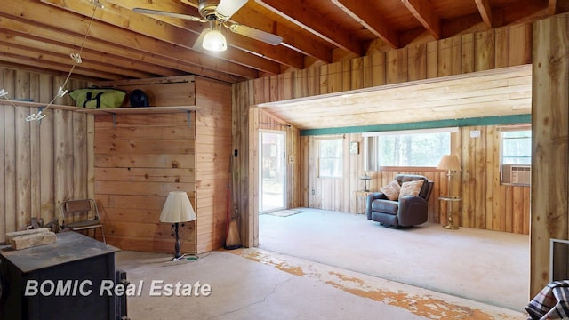 940 Wood River Rd, Grayling, MI 49738 - misc room featuring wooden walls, a ceiling fan, and cooling unit