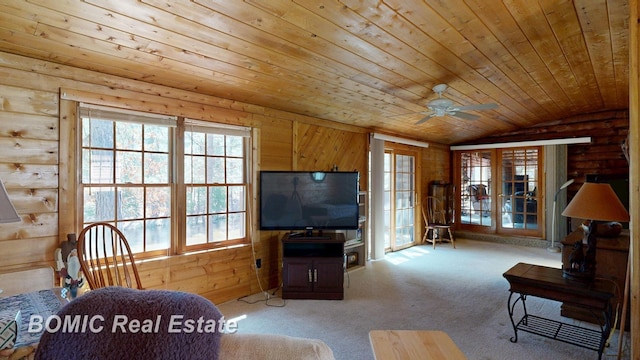 940 Wood River Rd, Grayling, MI 49738 - living room with healthy amount of natural light, wooden ceiling, lofted ceiling, carpet, and a ceiling fan