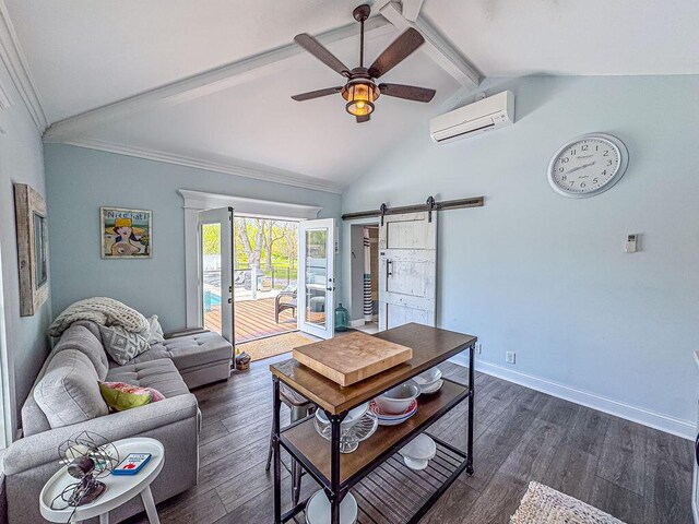 living area with an AC wall unit, beam ceiling, a barn door, a ceiling fan, and dark wood-style flooring
