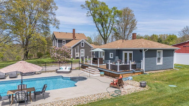 view of pool featuring a deck and a patio