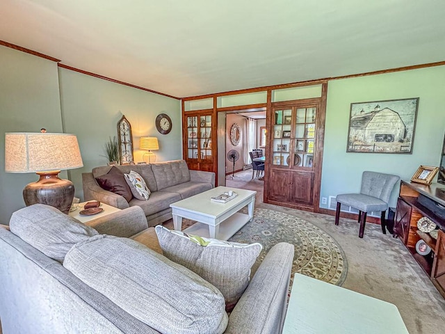 living room with french doors, carpet, and crown molding