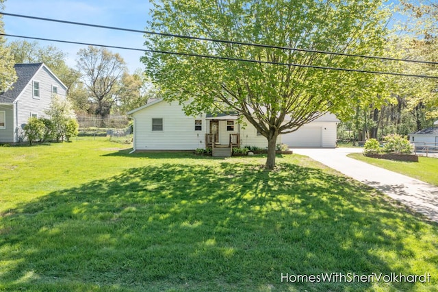 obstructed view of property featuring driveway