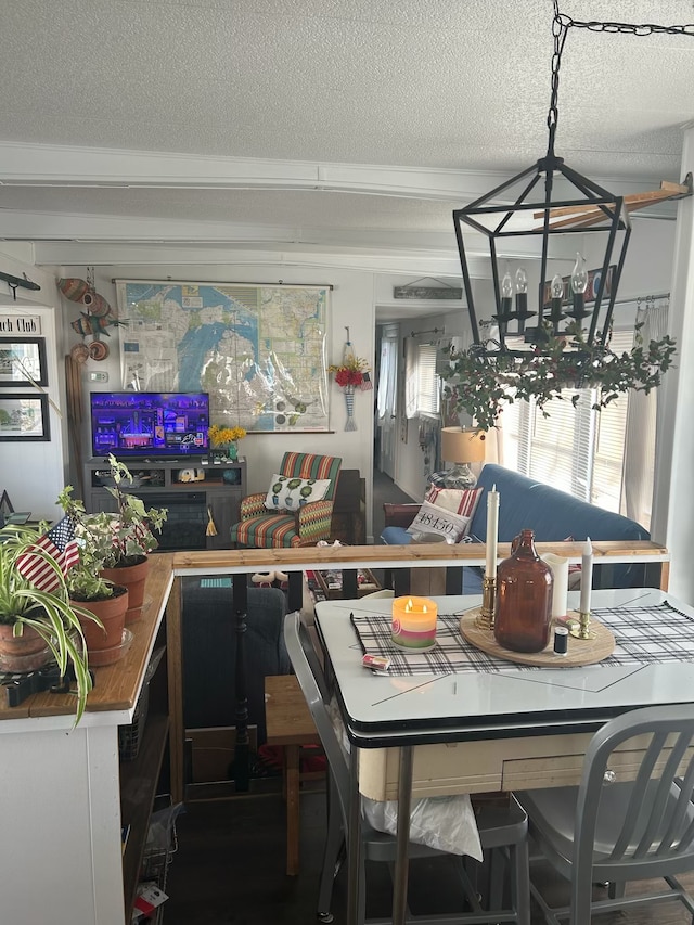 dining room with a textured ceiling