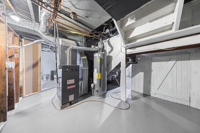 unfinished below grade area featuring water heater and heating unit