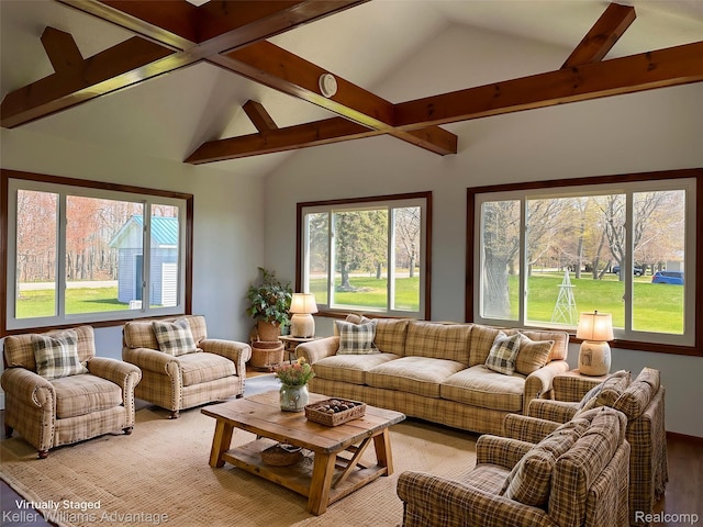 2800 E Booth Rd, Au Gres, MI 48703 - living room with beamed ceiling, plenty of natural light, light wood-type flooring, and high vaulted ceiling