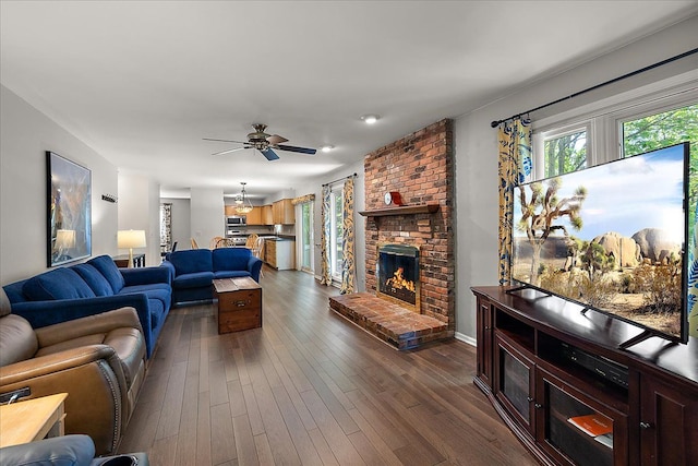 25455 Buckminster Dr, Novi, MI 48375 - living room featuring a brick fireplace, ceiling fan, dark wood-style floors, and baseboards