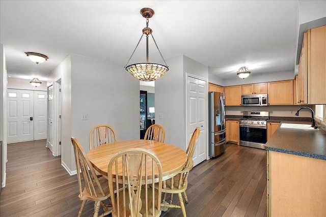 25455 Buckminster Dr, Novi, MI 48375 - dining area with dark wood-type flooring and baseboards