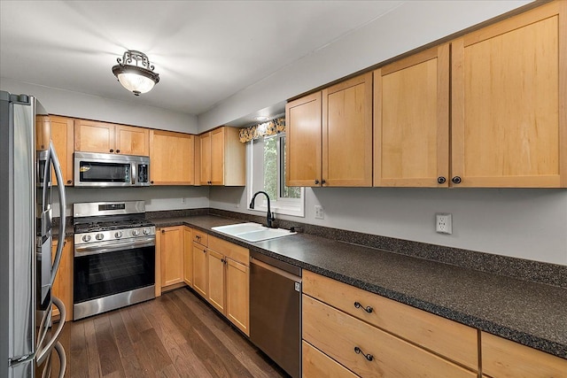 25455 Buckminster Dr, Novi, MI 48375 - kitchen featuring stainless steel appliances, a sink, dark wood-style floors, dark countertops, and light brown cabinets