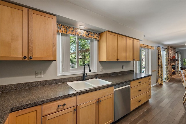 25455 Buckminster Dr, Novi, MI 48375 - kitchen with stainless steel dishwasher, a sink, healthy amount of natural light, and dark wood-type flooring