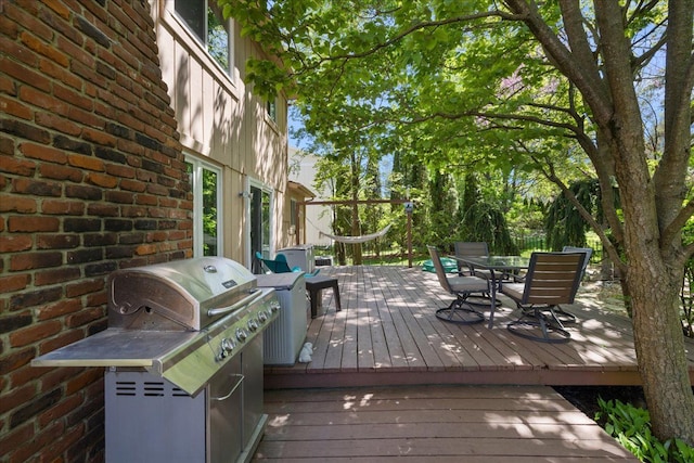 25455 Buckminster Dr, Novi, MI 48375 - deck with area for grilling, outdoor dining space, and exterior kitchen