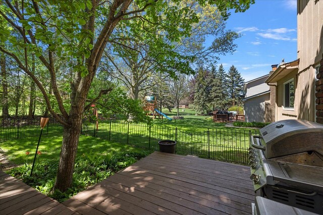 25455 Buckminster Dr, Novi, MI 48375 - wooden terrace featuring a playground and a grill