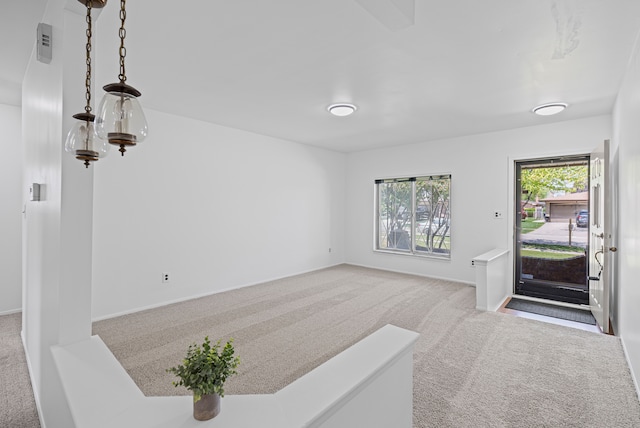 13488 Kingsville Dr, Sterling Heights, MI 48312 - entrance foyer with carpet floors and baseboards