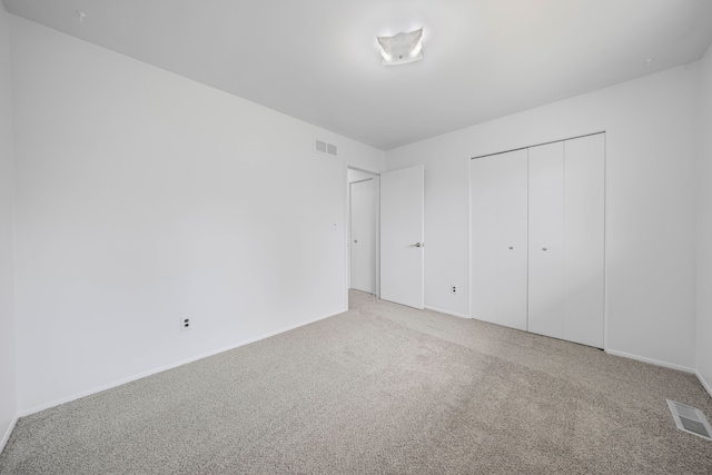 13488 Kingsville Dr, Sterling Heights, MI 48312 - unfurnished bedroom featuring carpet, baseboards, and a closet